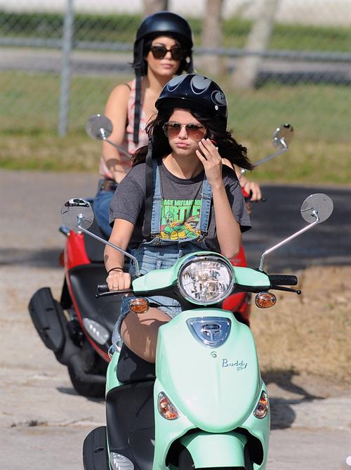 Selena Gomez Pictures Selena Gomez rides a scooter on set of spring breakers on February 29, 2012