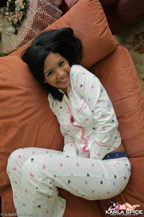 Karla Spice takes off her white pyjamas