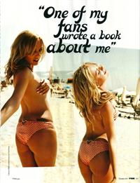 Alexandra Stan in a bikini - ass