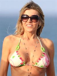 Rita Rusic in a bikini on the beach